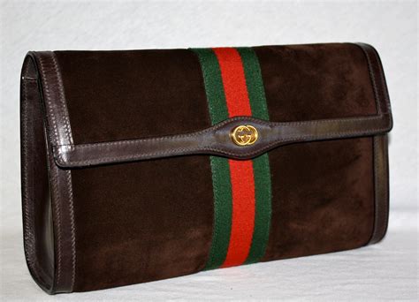 gucci clutch heren|Gucci vintage suede clutch.